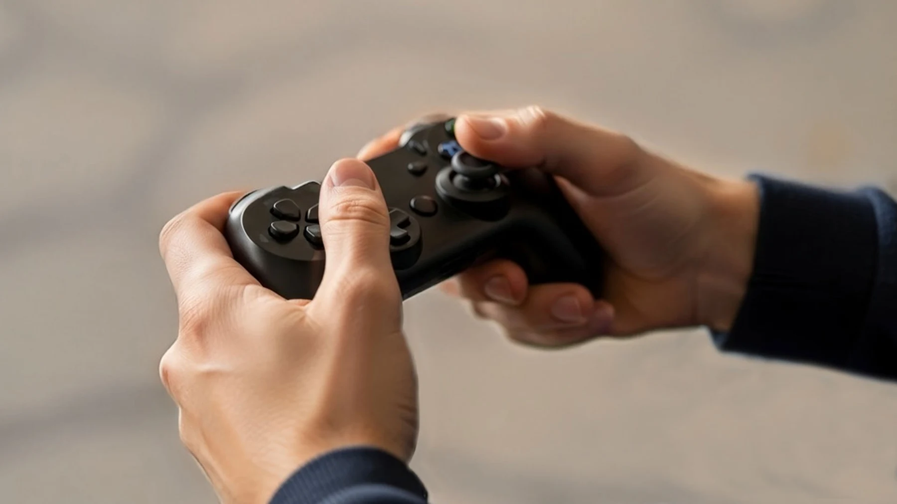 A visitor using a controller to play Army Drone Racer